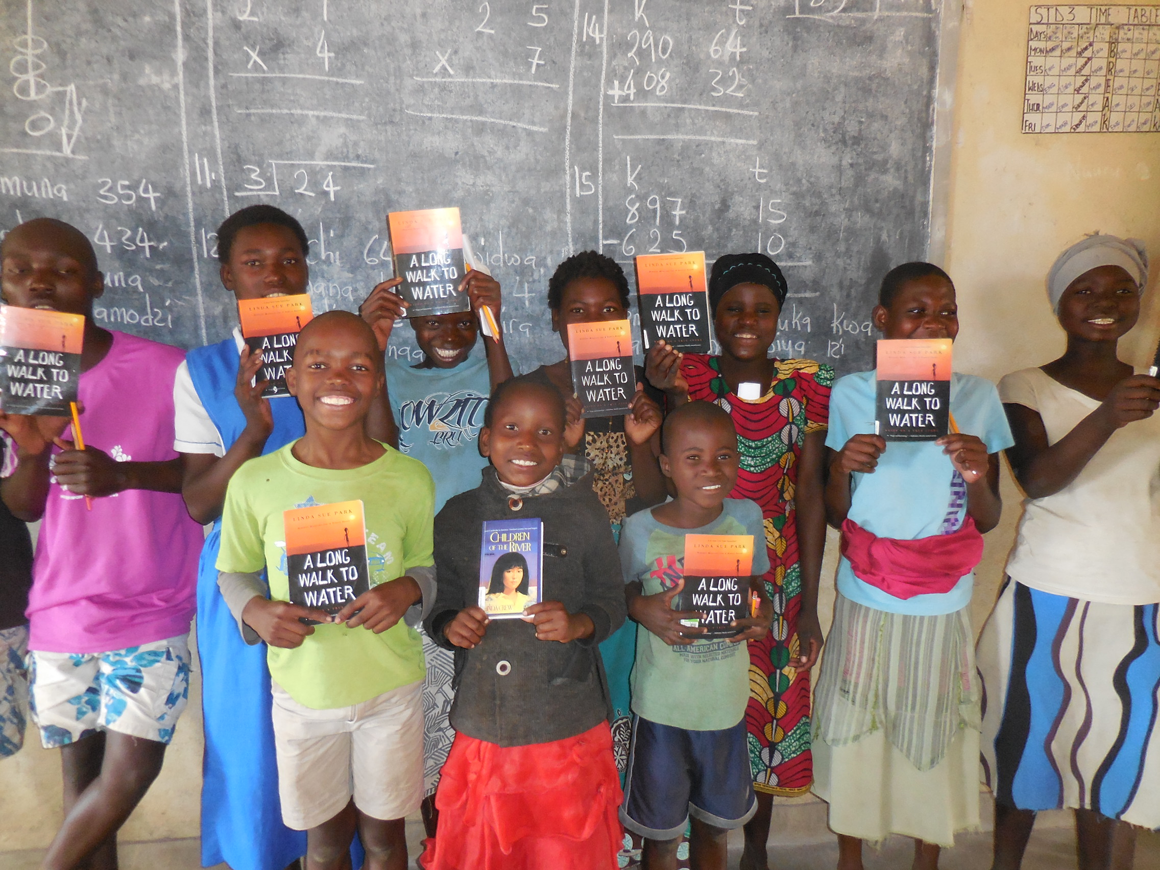 Kids in Malawi with books
